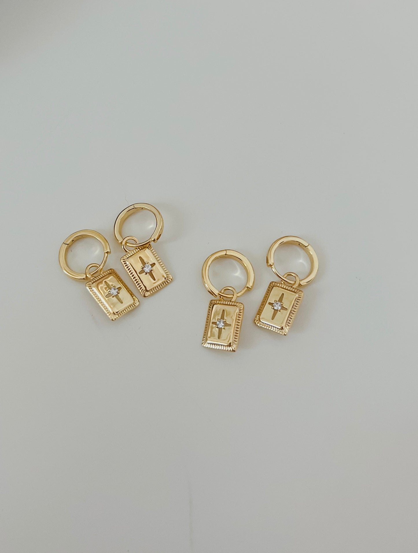 compass huggie hoops