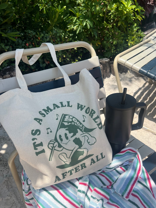 it’s a small world tote bag