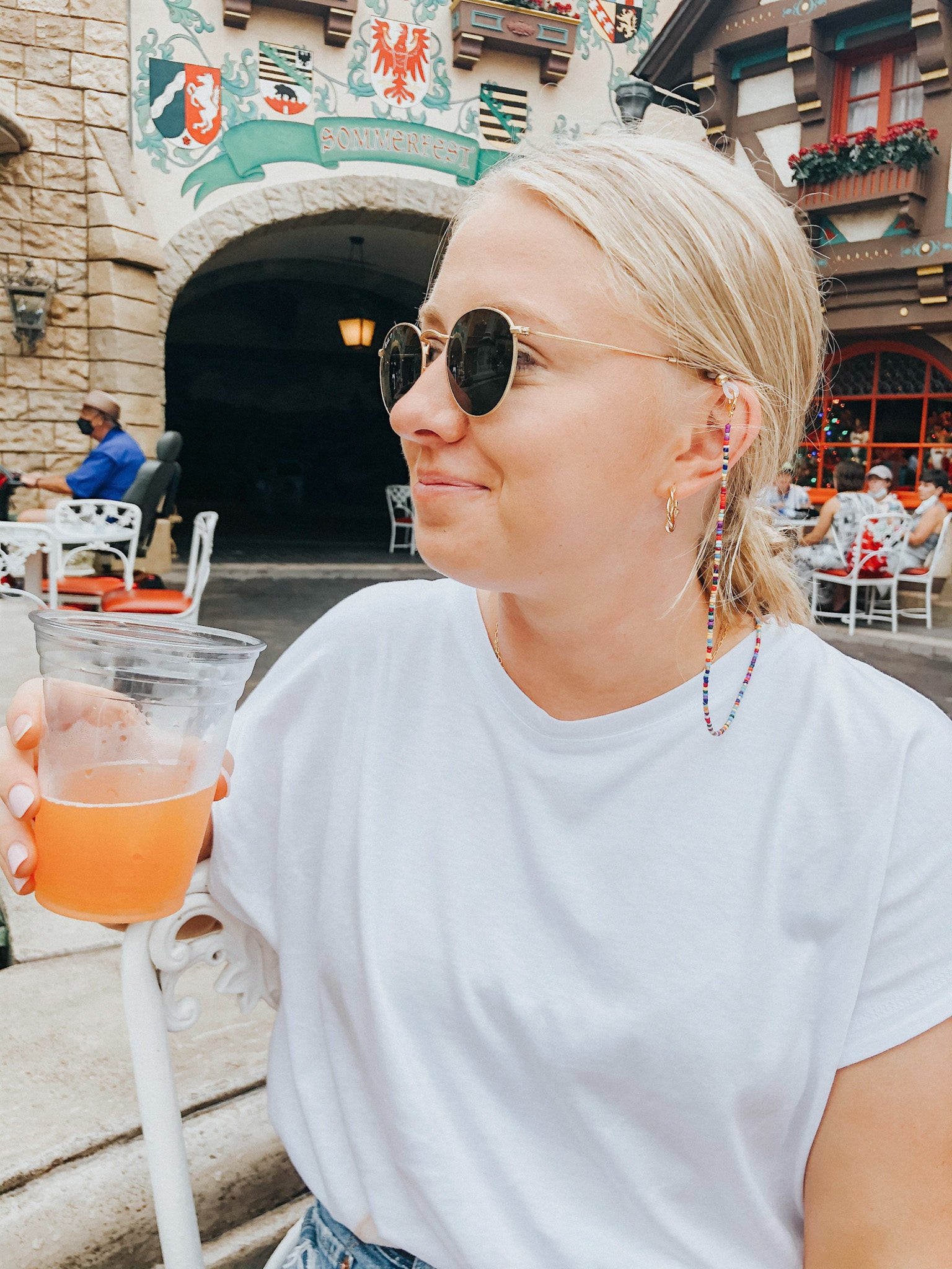 This sunglass chain is made of very small beads and is a very thin chain. It is many different colors in no pattern or order.